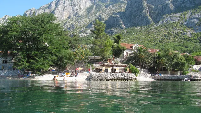 Clear blue water at Orahovac beach in the Bay of Kotor